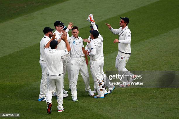 Trent Boult of New Zealand celebrates his wicket of Dimuth Karunaratne of Sri Lanka during day one of the Second Test match between New Zealand and...