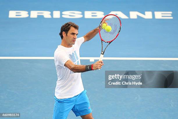 Roger Federer plays a backhand during a practise session ahead of the 2015 Brisbane International at Queensland Tennis Centre on January 3, 2015 in...