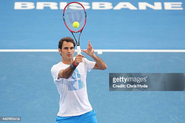 Roger Federer plays a backhand during a practise session ahead of the 2015 Brisbane International at Queensland Tennis Centre on January 3, 2015 in...