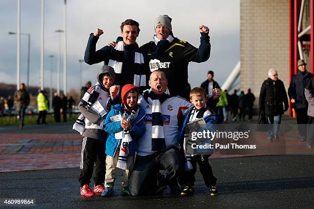 Bolton fans pose for a photograph prior to the FA Cup Third Round match between Bolton Wanderers and Wigan Athletic at the Macron Stadium on January...