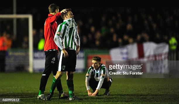 Blyth player Stephen Turnball is consoled as Jarrett Rivers looks on after the FA Cup Third Round match between Blyth Spartans and Birmingham City at...