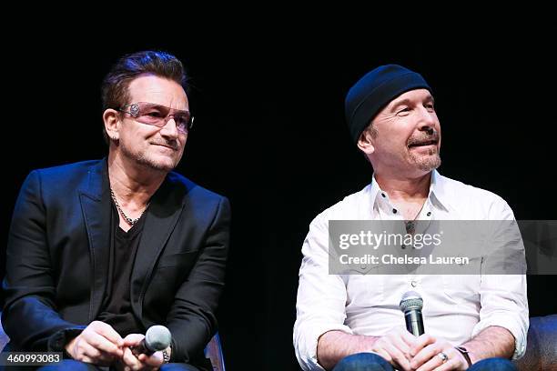 Musicians Bono and The Edge attend the 25th annual Palm Springs Film Festival - Talking Pictures on January 5, 2014 in Palm Springs, California.