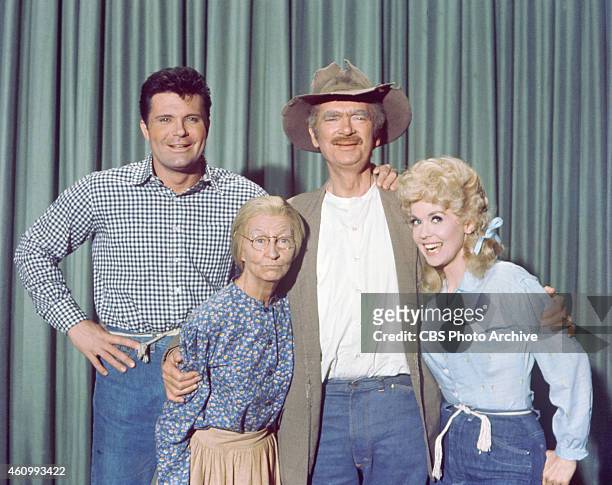 Cast. Left to right: Max Baer, Jr. ; Irene Ryan ; Buddy Ebsen ; and Donna Douglas . Image dated January 1, 1963.