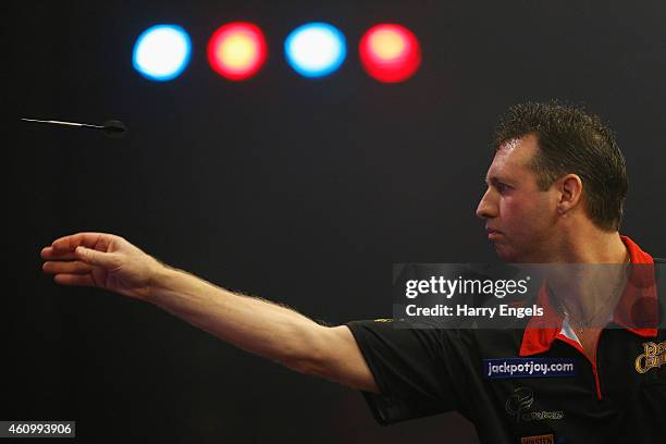 David Cameron of Canada throws during his Preliminary Round match against Michel Van Der Horst of the Netherlands on day one of the BDO Lakeside...