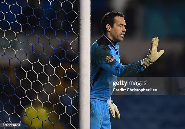 David Forde of Millwall organises his wall during the FA Cup Third Round match between Millwall and Bradford City at The Den on January 3, 2015 in...