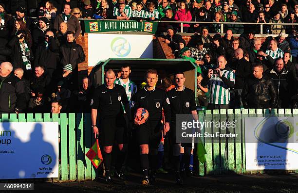 Referee Mike Jones leads the officials out onto the pitch before the FA Cup Third Round match between Blyth Spartans and Birmingham City at Croft...
