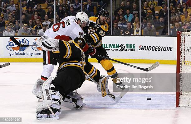 Bobby Ryan of the Ottawa Senators scores by Tuukka Rask of the Boston Bruins in overtime for the win at TD Garden on January 3, 2015 in Boston,...