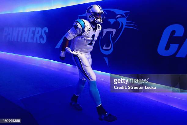 Cam Newton of the Carolina Panthers walks through the tunnel towards the field prior to their NFC Wild Card Playoff game against the Arizona...