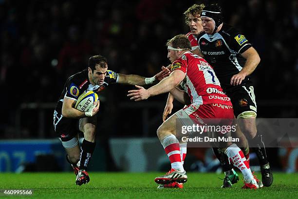 Haydn Thomas of Exeter Chiefs takes on Matt Kvesic of Gloucester during the Aviva Premiership match between Exeter Chiefs and Gloucester Rugby at...