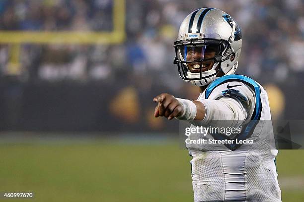 Cam Newton of the Carolina Panthers reacts after winning 27-16 against the Arizona Cardinals after their NFC Wild Card Playoff game at Bank of...