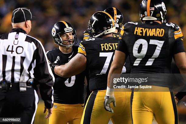 Shaun Suisham of the Pittsburgh Steelers celebrates after hitting a field goal in the first quarter against the Baltimore Ravens during their AFC...