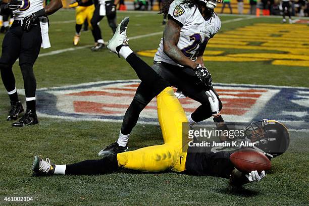 Martavis Bryant of the Pittsburgh Steelers celebrates a fourth quarter touchdown against the Baltimore Ravens during their AFC Wild Card game at...