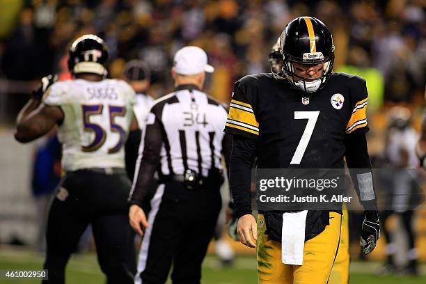 Ben Roethlisberger of the Pittsburgh Steelers reacts and walks back to the bench in the fourth quarter against the Baltimore Ravens during their AFC...