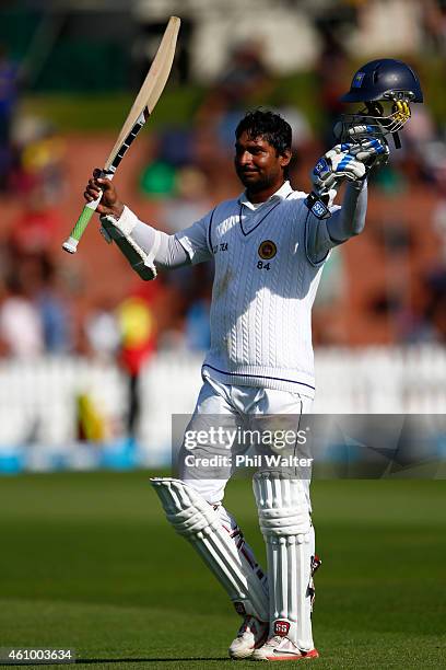 Kumar Sangakkara of Sri Lanka leaves the field on 203 runs after being caught by Trent Boult during day two of the Second Test match between New...