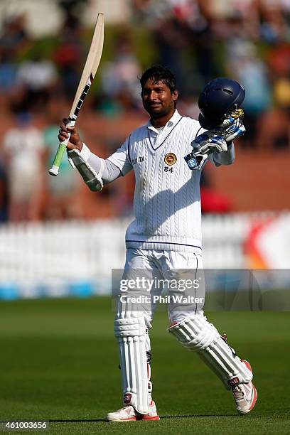 Kumar Sangakkara of Sri Lanka leaves the field on 203 runs after being caught by Trent Boult during day two of the Second Test match between New...