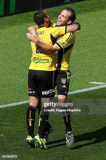 Manny Muscat of the Phoenix is congratulted on his goal by teammate Jeremy Brockie during the round 15 A-League match between the Wellington Phoenix...
