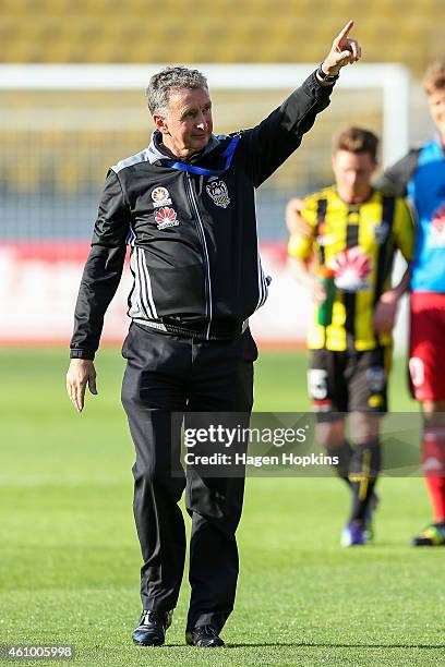 Coach Ernie Merrick of the Phoenix gestures to fans after winning the round 15 A-League match between the Wellington Phoenix and Brisbane Roar at...