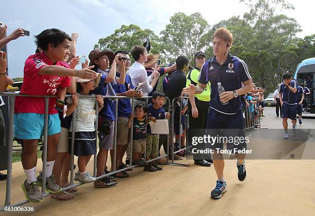 Gotoku Sakai of Japan arrives at the ground before the Asian Cup practice match between Japan and Auckland City on January 4, 2015 in Cessnock,...