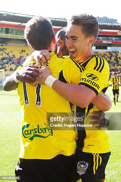 Jeremy Brockie of the Phoenix is congratulated on his second goal by Tyler Boyd during the round 15 A-League match between the Wellington Phoenix and...