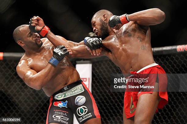 Light heavyweight champion Jon Jones punches Daniel Comier during the UFC 182 event at the MGM Grand Garden Arena on January 3, 2015 in Las Vegas,...