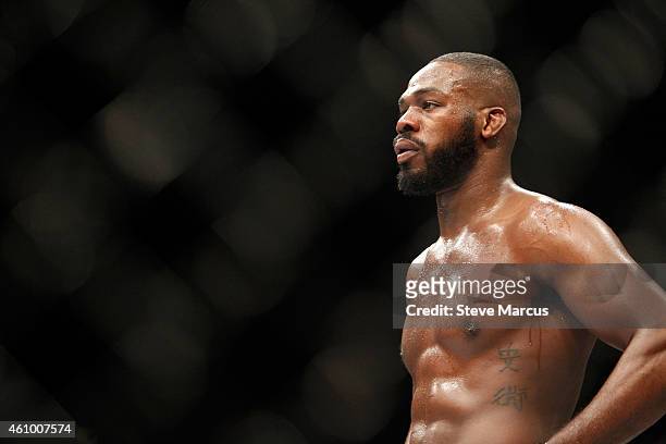 Light heavyweight champion Jon Jones waits in a timeout as he defends his title against Daniel Cormier during the UFC 182 event at the MGM Grand...