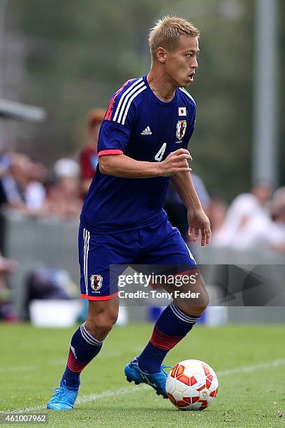 Keisuke Honda of Japan contests the ball during the Asian Cup practice match between Japan and Auckland City on January 4, 2015 in Cessnock,...