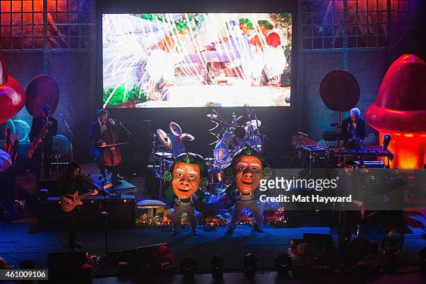 Oompa Loompas dance on stage with Primus and the Chocolate Factory with the Fungi Ensemble performs on stage at Paramount Theatre on January 3, 2015...