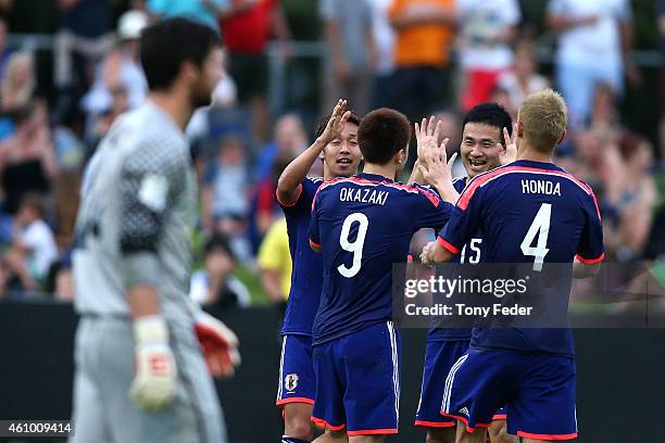 Japan players celebrate a goal during the Asian Cup practice match between Japan and Auckland City on January 4, 2015 in Cessnock, Australia.