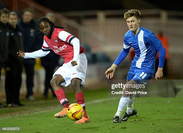 Tafari Moore of Arsenal is closed down by Oliver Luto of Peterborough during the match between Peterborough United U18 and Arsenal U18 in the FA...