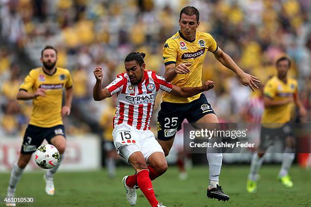 Eddy Bosnar of the Mariners contests the ball against James Brown of Melbourne City during the round 15 A-League match between the Central Coast...