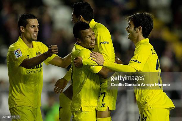 Ikechukwu Uche of Villarreal CF celebrates scoring their fourth goal with teammates Jeremy Louis Perbet , Javier Ignacio Aquino and Manuel Trigueros...