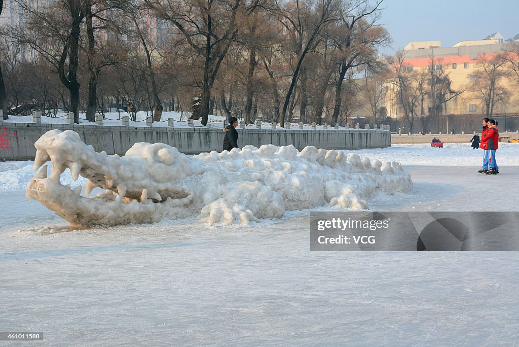 Snow Sculpture Of Crocodile Shows In Jilin