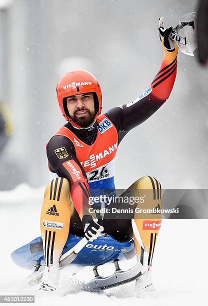 Andi Langenhan of Germany celebrates as he finishes second in the Men's FIL Luge World Cup Koenigssee at Deutsche Post Eisarena on January 4, 2015 in...