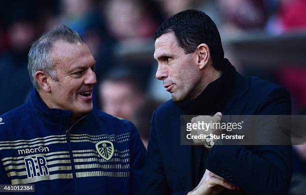 Leeds manager Neil Redfearn chats with Gus Poyet before the FA Cup Third Round match between Sunderland and Leeds United at Stadium of Light on...