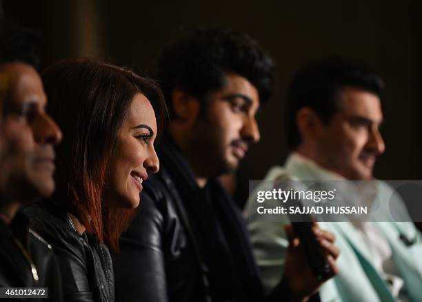 Indian Bollywood personalities Manoj Bajpai, Sonakshi Sinha, Arjun Kapoor, and Sanjay Kapoor speak with the media during a promotional event for the...