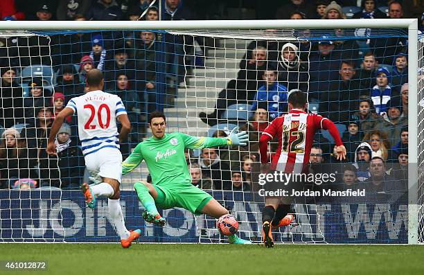 Marc McNulty of Sheffield United scores their first goal past goalkeeper Alex McCarthy of QPR during the FA Cup Third Round match between Queens Park...