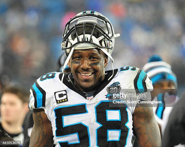 Thomas Davis of the Carolina Panthers celebrates with teammates late in the NFC Wild Card Playoff game against the Arizona Cardinals on January 3,...