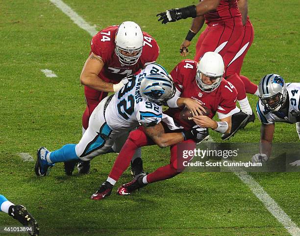 Dwan Edwards of the Carolina Panthers sacks Ryan Lindley of the Arizona Cardinals during the NFC Wild Card Playoff game on January 3, 2015 at Bank of...