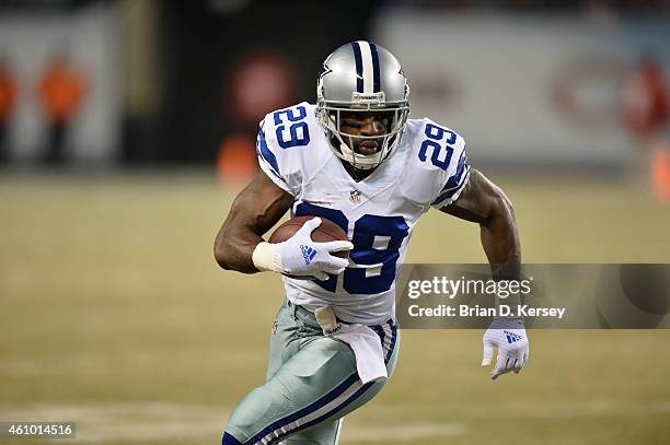 DeMarco Murray of the Dallas Cowboys carries the ball during the first quarter against the Chicago Bears at Soldier Field on December 4, 2014 in...