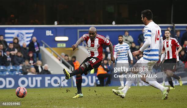 Sheffield United's English-Jamaican midfielder Jamal Campbell-Ryce shoots to score their third goal during the English FA Cup third round football...