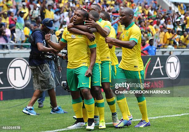 Thuso Phala of South Africa celebrates with his teammates after scoring a goal during the friendly football match between Zambia and South Africa at...