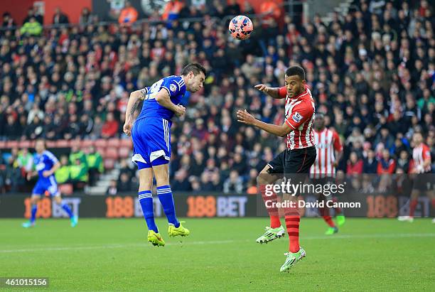 Darren Ambrose of Ipswich Town beats Ryan Bertrand of Southampton in the air to score Ipswich's first goal during the FA Cup Third Round match...
