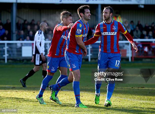 Scott Dann of Crystal Palace celebrates his second goal during to the FA Cup third round match between Dover Athletic and Crystal Palace at the...