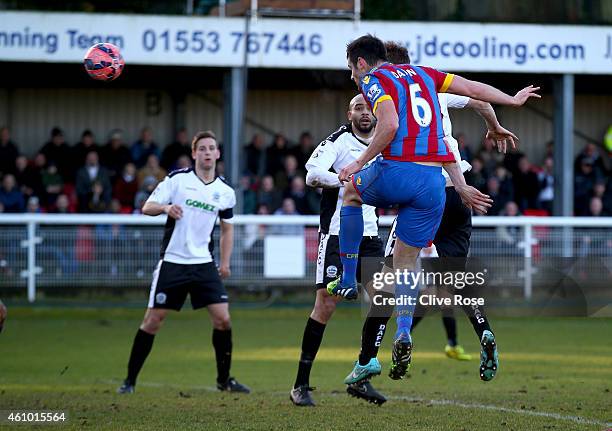 Scott Dann of Crystal Palace scores his second goal during to the FA Cup third round match between Dover Athletic and Crystal Palace at the Crabble...