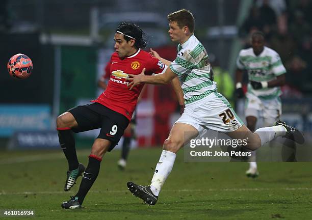 Radamel Falcao of Manchester United in action with Ben Nugent of Yeovil Town during the FA Cup Third Round match between Yeovil Town and Manchester...