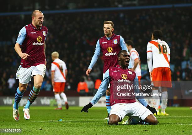 Christian Benteke of Aston Villa celebrates scoring the opening goal during the FA Cup Third Round match between Aston Villa and Blackpool at Villa...