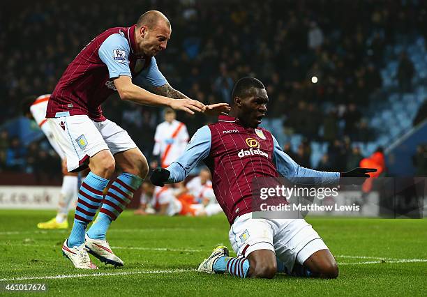 Christian Benteke of Aston Villa celebrates scoring the opening goal with Alan Hutton during the FA Cup Third Round match between Aston Villa and...