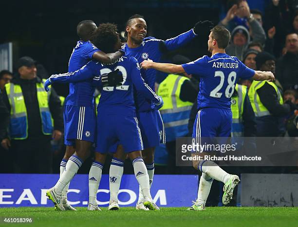 Willian of Chelsea celebrates with Ramires , Didier Drogba and Cesar Azpilicueta as he scores their first goal during the FA Cup Third Round match...