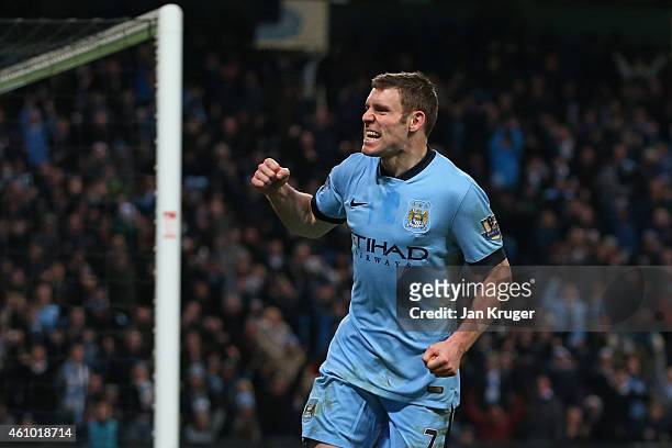 James Milner of Manchester City celebrates after scoring a goal to level the scores at 1-1 during the FA Cup Third Round match between Manchester...