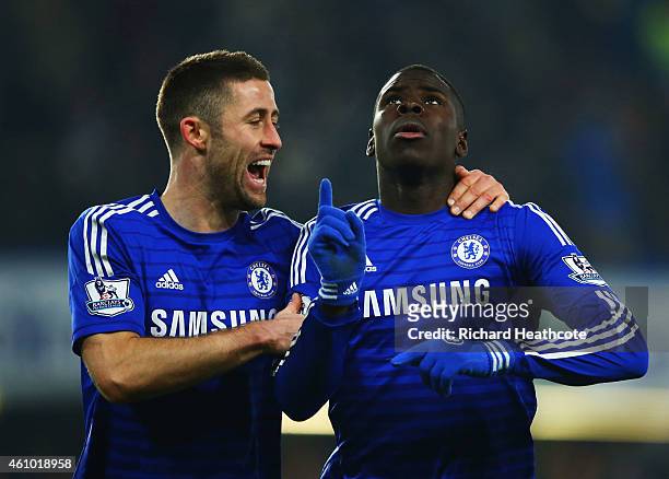 Kurt Zouma of Chelsea celebrates with Gary Cahill as he scores their third goal during the FA Cup Third Round match between Chelsea and Watford at...